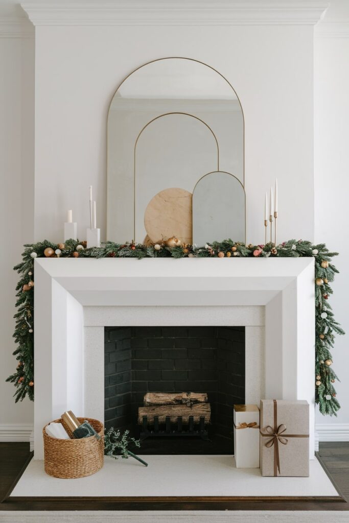 architectural minimalist Christmas mantel design arch mirrors