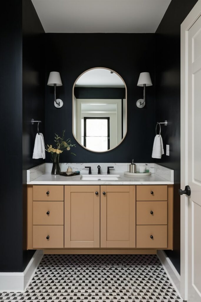 bathroom with black walls, faucet and tan vanity