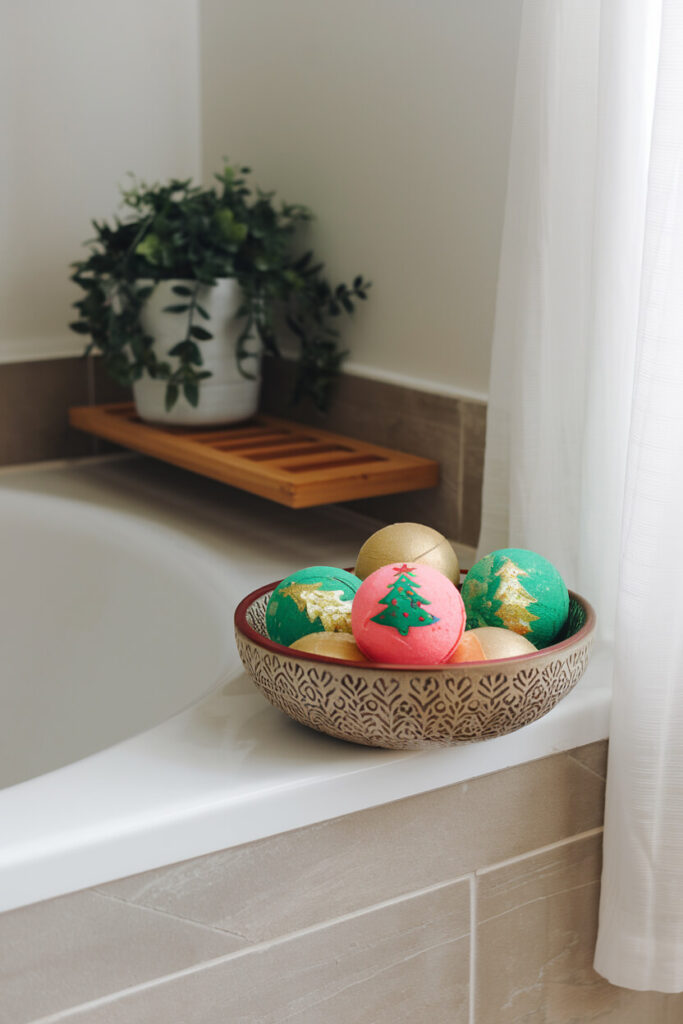 contemporary bathroom with a holiday themed bowl of bath bombs for Christmas decor