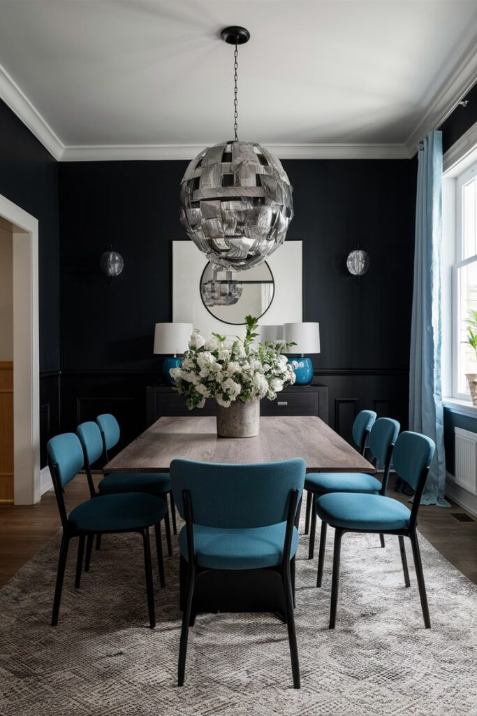 dining room with base black color, accent light blue dining chairs, table lamps