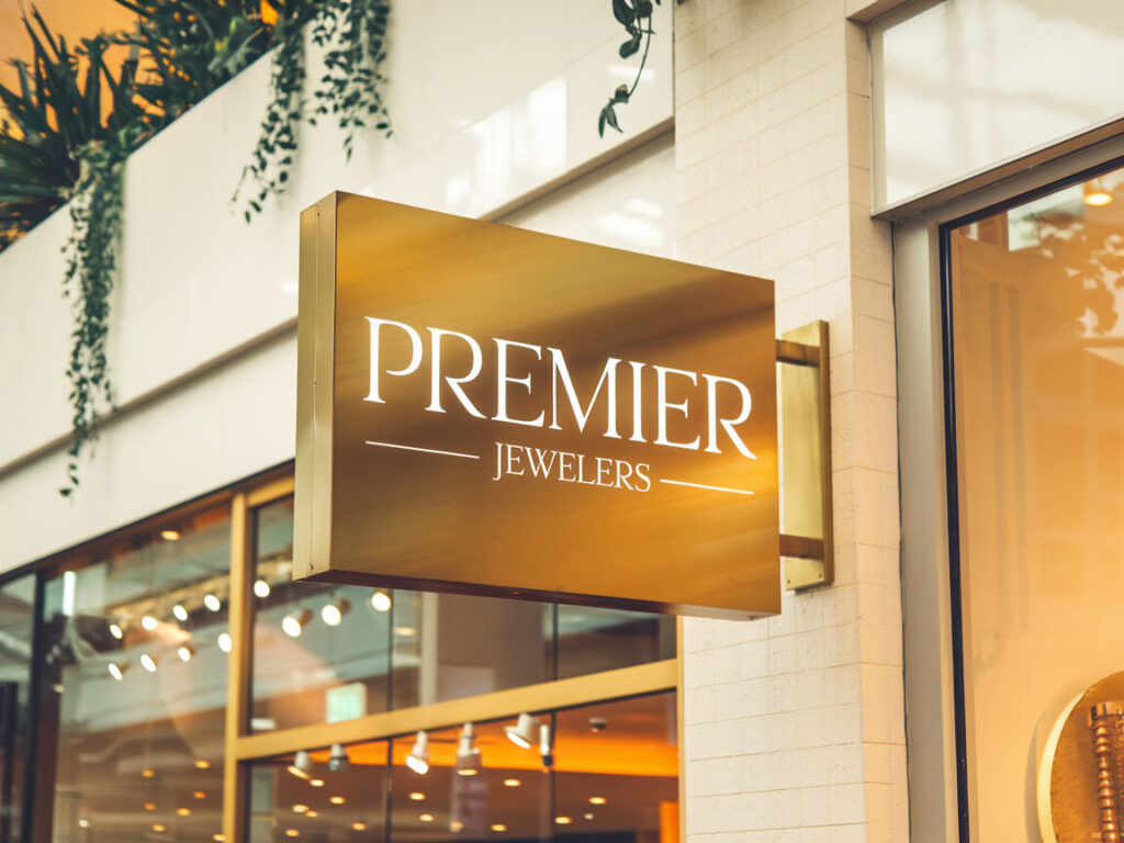 jewelry store sign in a mall golden color premier luxury brand