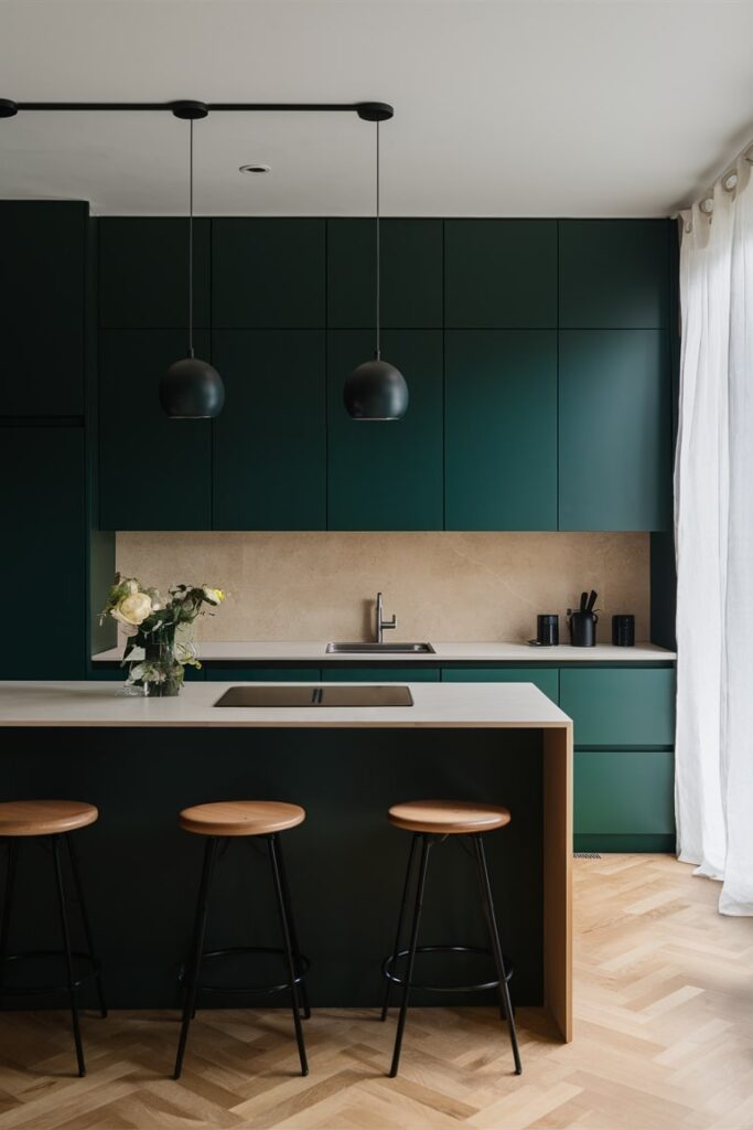 minimalist kitchen with primary dark green color cabinets and beige backsplash