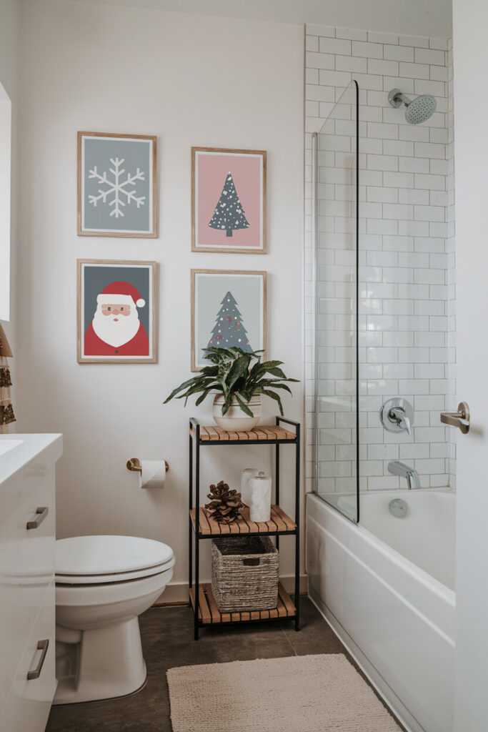 modern bathroom with small framed holiday prints wall art