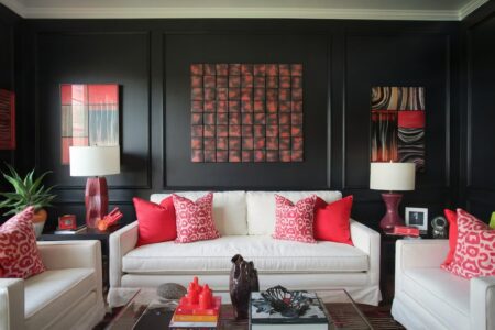 colors that go with red, black walls, white couch, red pillows