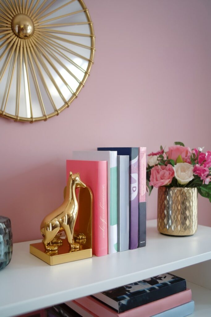 gold metallic bookends in the feminine home office