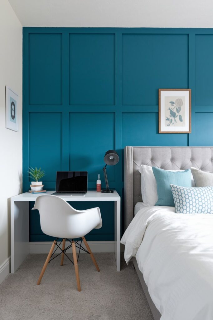bedside workspace with white desk, blue board and batten wall