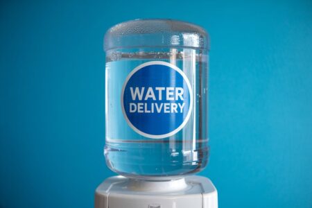 big bottle on the cooler with a text "water delivery"