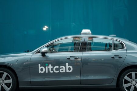 modern gray taxi car with branding