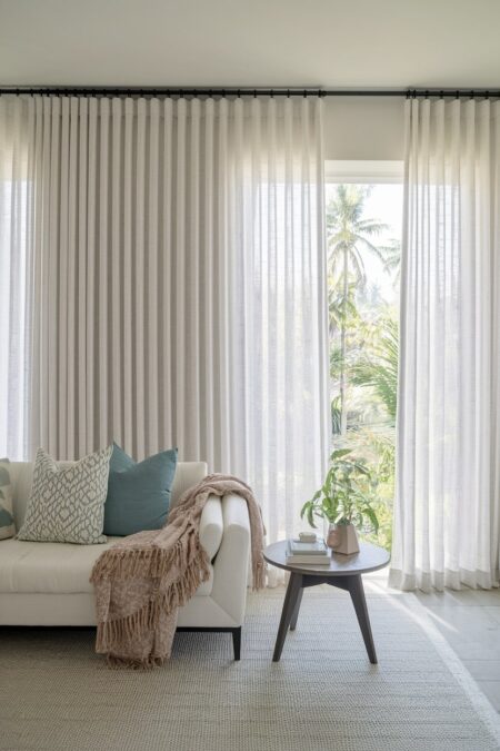 breezy, airy curtains summer decor, white couch in the modern living room