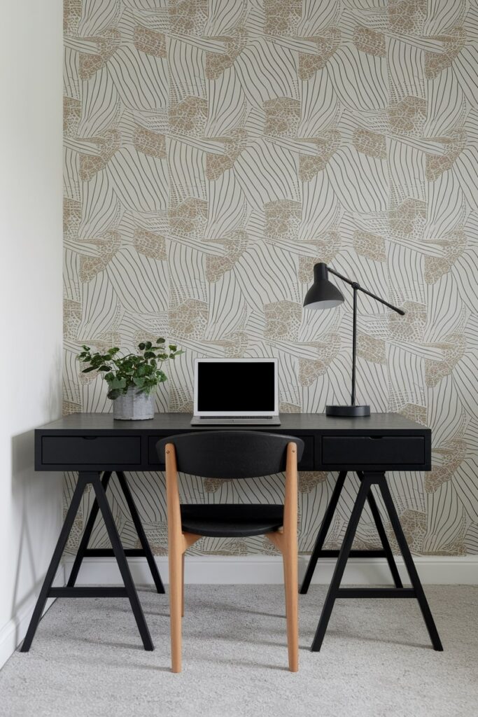 small home office, neutral pattern wallpaper, black furniture and desk lamp