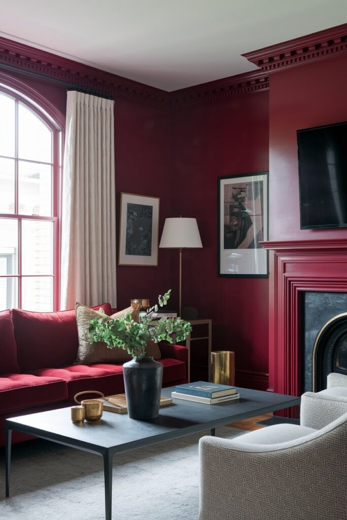 deep crimson red living room with velvet couch and white curtains
