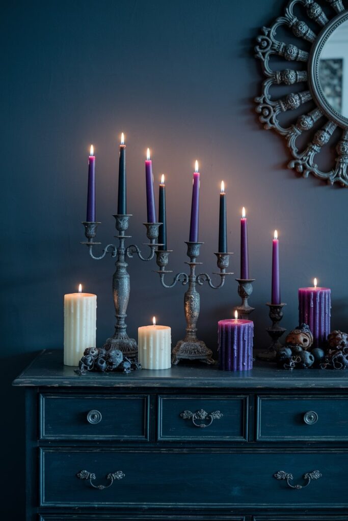 gothic candle displays (deep purple and black) on dresser as Halloween bedroom decor