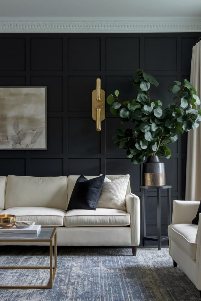 living room has deep charcoal walls with board and batten, cream-colored furniture, and brass accents
