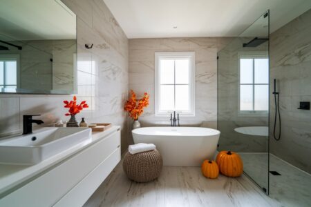 modern bathroom with fall decorations, pumpkins