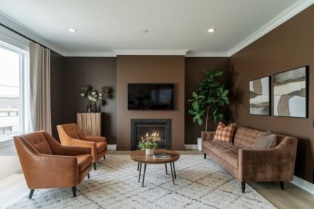 modern brown living room with leather and velvet furniture, fireplace