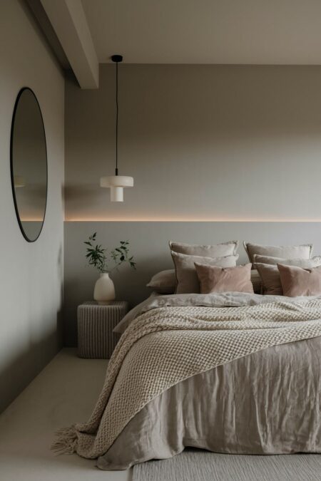 cozy modern bedroom in monochromatic taupe color palette