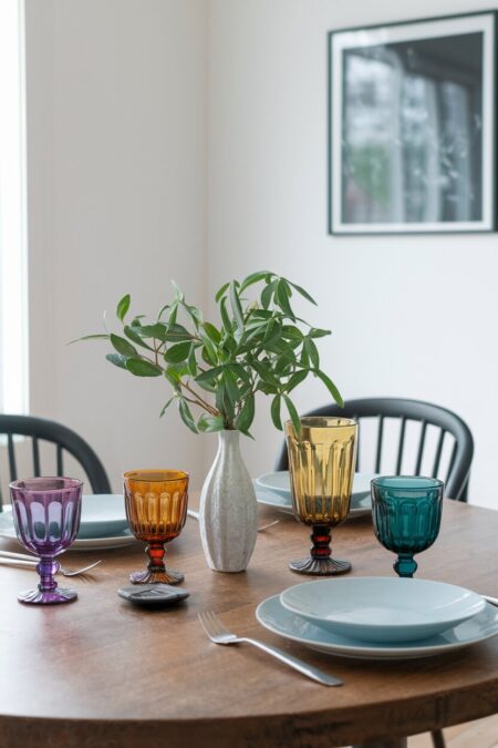 amethyst, amber, and teal glasses as summer dining room decor