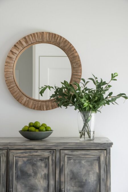 bowl of limes on the console table as summer entryway decor