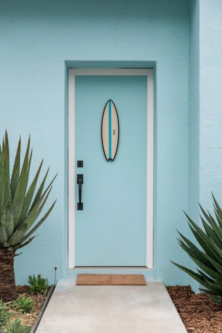 mini surfboard as summer door decor