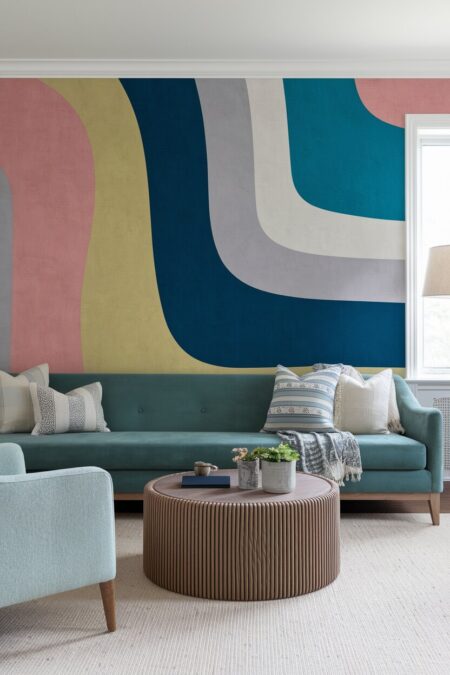 modern living room with a colorful abstract wallpaper and low-profile sofa