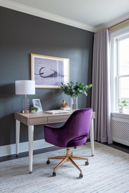 home office with gray walls and a purple velvet office chair