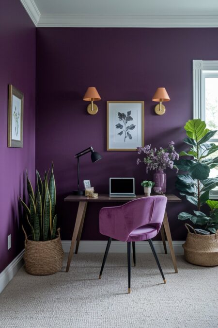 deep purple home office with a velvet chair and brass wall sconces with orange shades