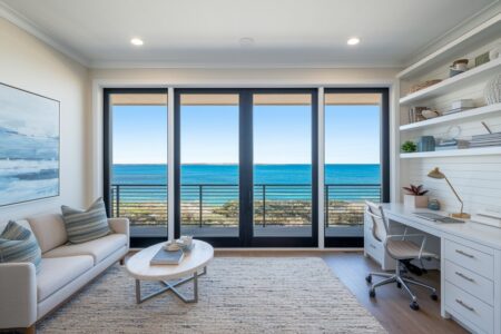 modern coastal style home office with large windows