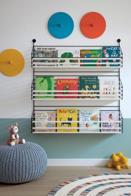 playroom with low, kid-height floating bookshelves